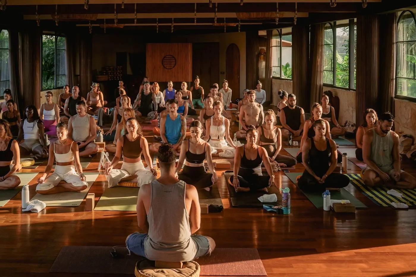 Full class practicing together in the Bali shala